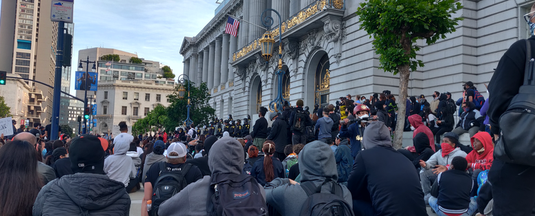 Protesters at a Sunday night event in front of San Francisco City Hall. Protesters at a Sunday night event in front of San Francisco City Hall.