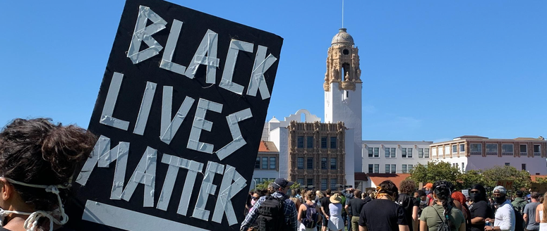 A protester holds a sign in San Francisco's Dolores Park during a Black Lives Matter protest. A protester holds a sign in San Francisco's Dolores Park during a Black Lives Matter protest.