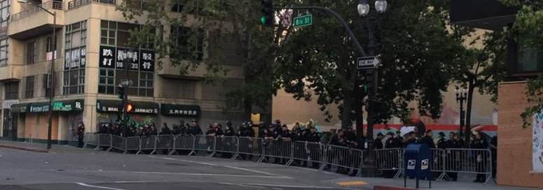 A line of officers in downtown Oakland on Wednesday night. A line of officers in downtown Oakland on Wednesday night.