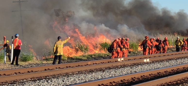 Firefighters battle flames in the marshland area in Suisun City. Firefighters battle flames in the marshland area in Suisun City.