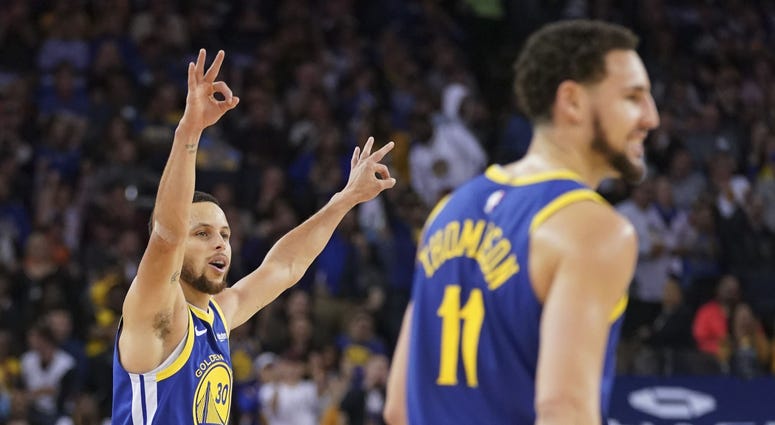 April 5, 2019; Oakland, CA, USA; Golden State Warriors guard Stephen Curry (30) and guard Klay Thompson (11) celebrate after a made three-point basket against the Cleveland Cavaliers during the second quarter at Oracle Arena. April 5, 2019; Oakland, CA, USA; Golden State Warriors guard Stephen Curry (30) and guard Klay Thompson (11) celebrate after a made three-point basket against the Cleveland Cavaliers during the second quarter at Oracle Arena.