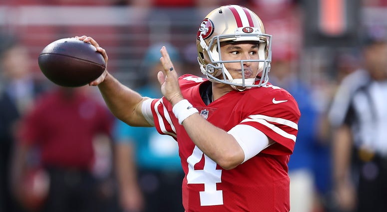 San Francisco 49ers quarterback Nick Mullens throws a pass against the Oakland Raiders during the first half of an NFL football game in Santa Clara, Calif., Thursday, Nov. 1, 2018.