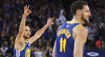 April 5, 2019, Oakland CA Stephen Curry and Klay Thompson celebrate after a 3 point basket against the Cleveland Cavaliers at Oracle Arena Splash Bros