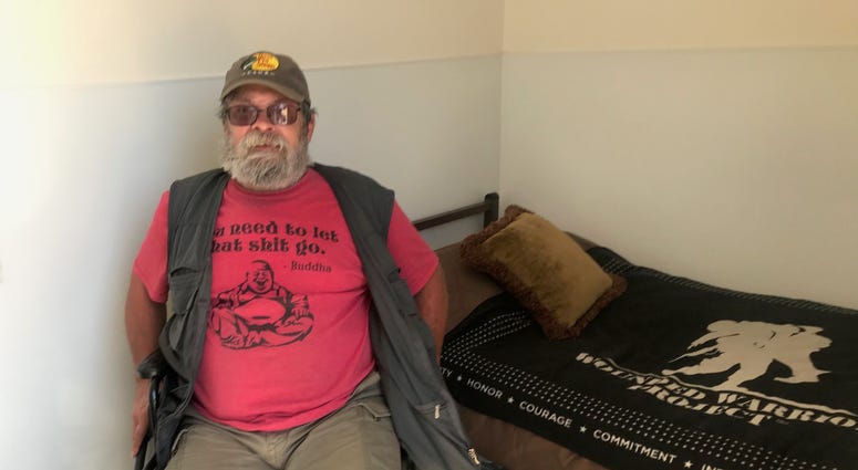 A homeless resident in his new, socially distanced shelter A homeless resident in his new, socially distanced shelter