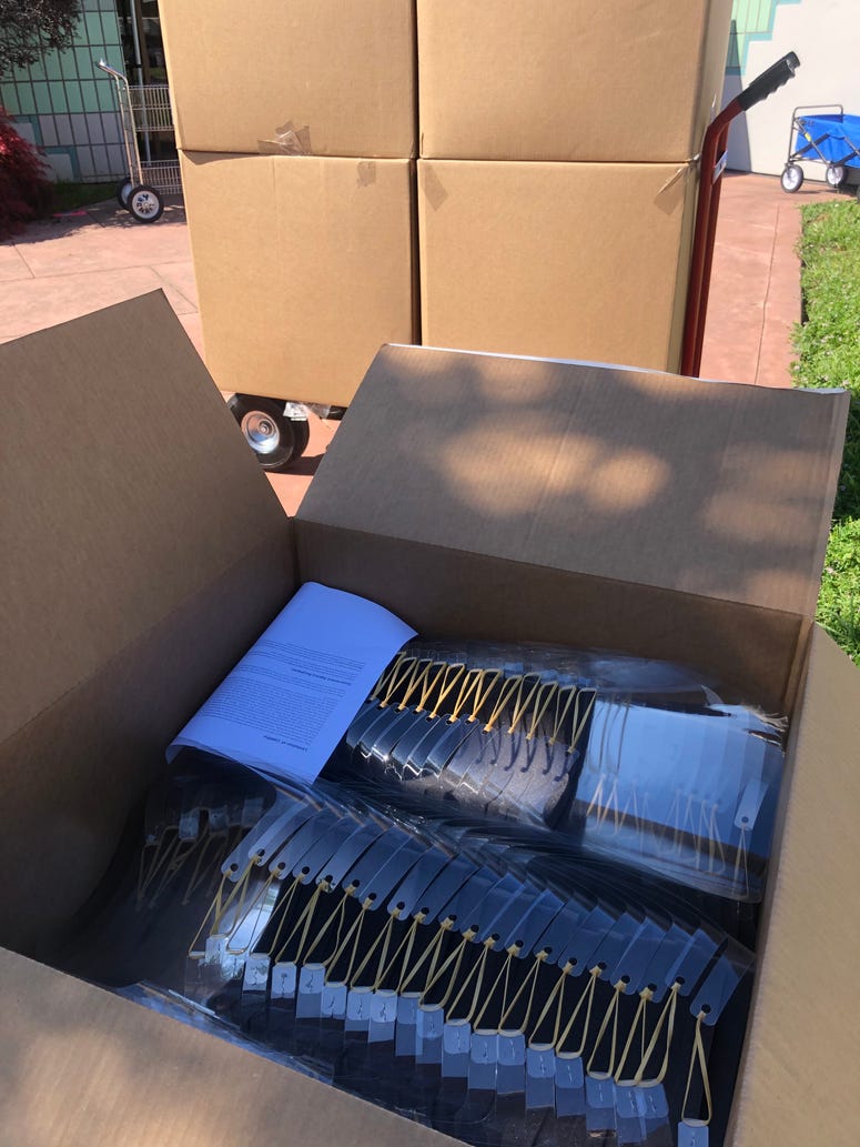 A box of face shields secured, designed and donated by Google to the Valley Medical Center Foundation. A box of face shields secured, designed and donated by Google to the Valley Medical Center Foundation.