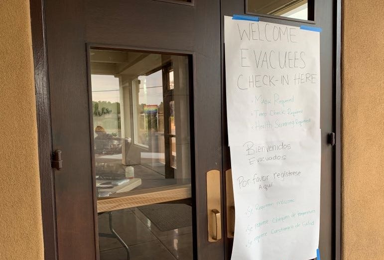 Sign at the Crosswalk Church evacuation center in Napa notifies evacuees of pandemic restrictions