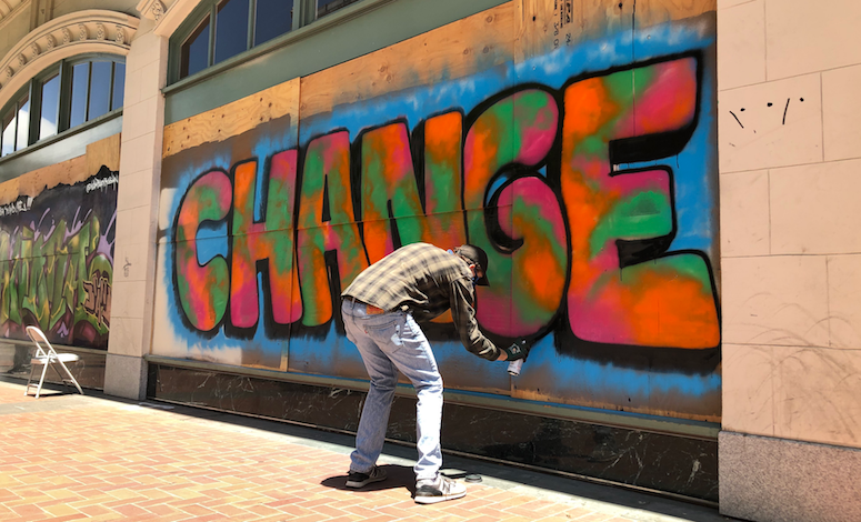 Oakland's art community is rushing to preserve dozens of pieces of protest art. Maxwell Shaver is seen here creating one of those murals. Oakland's art community is rushing to preserve dozens of pieces of protest art. Maxwell Shaver is seen here creating one of those murals.