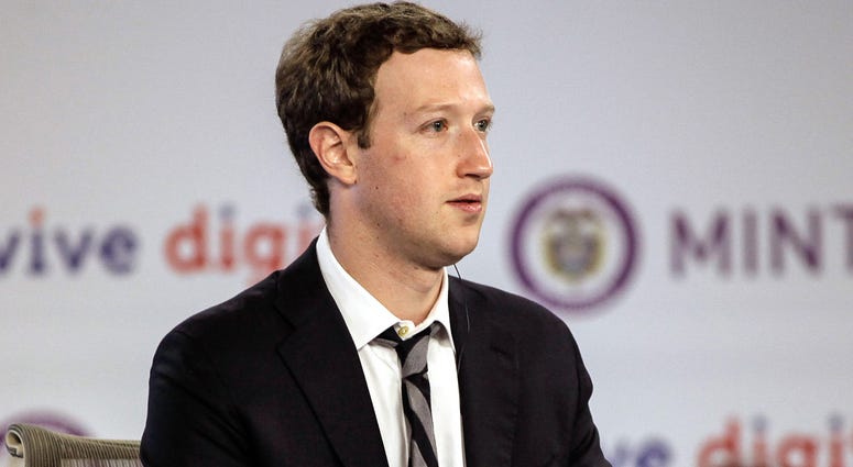 Facebook CEO Mark Zuckerberg Manuel Santos at Narino House in Bogota, capital of Colombia, on Jan. 14, 2015. Colombian President Juan Manuel Santos Wednesday met with Facebook founder Mark Zuckerberg in Bogota to discuss plans to bring Internet service to the masses.