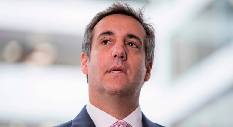 AP18099729357750 FILE - In this Sept. 19, 2017 file photo, President Donald Trump's personal attorney Michael Cohen appears in front of members of the media after a closed door meeting with the Senate Intelligence Committee on Capitol Hill, in Washington. Federal agents c