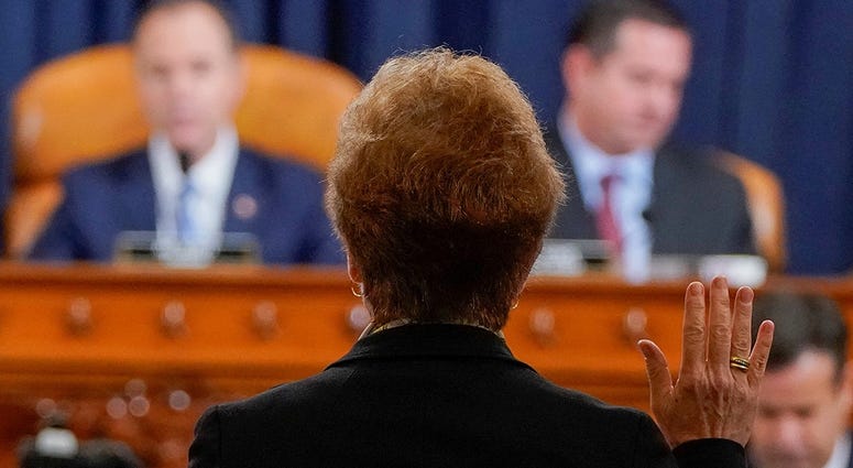 Marie Yovanovitch, former U.S. ambassador to Ukraine, is sworn in before a House Intelligence Committee hearing as part of the impeachment inquiry into U.S. President Donald Trump on Capitol Hill in Washington, U.S., November 15, 2019. Marie Yovanovitch, former U.S. ambassador to Ukraine, is sworn in before a House Intelligence Committee hearing as part of the impeachment inquiry into U.S. President Donald Trump on Capitol Hill in Washington, U.S., November 15, 2019.
