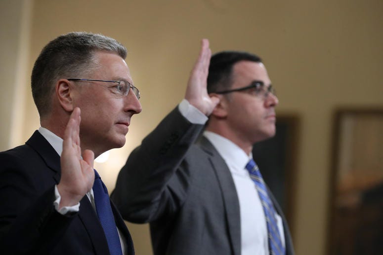 Former State Department special envoy to Ukraine Kurt Volker (L) and former National Security Council Senior Director for European and Russian Affairs Tim Morrison are sworn in before testifying to the House Intelligence Committee on Nov. 19, 2019. Former State Department special envoy to Ukraine Kurt Volker (L) and former National Security Council Senior Director for European and Russian Affairs Tim Morrison are sworn in before testifying to the House Intelligence Committee on Nov. 19, 2019.