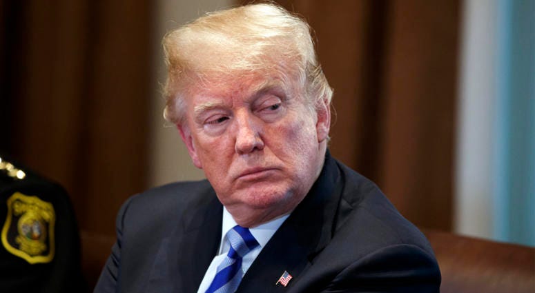 AP18136748134801 President Donald Trump listens during a roundtable on immigration policy in California, in the Cabinet Room of the White House, Wednesday, May 16, 2018, in Washington. (AP Photo/Evan Vucci)