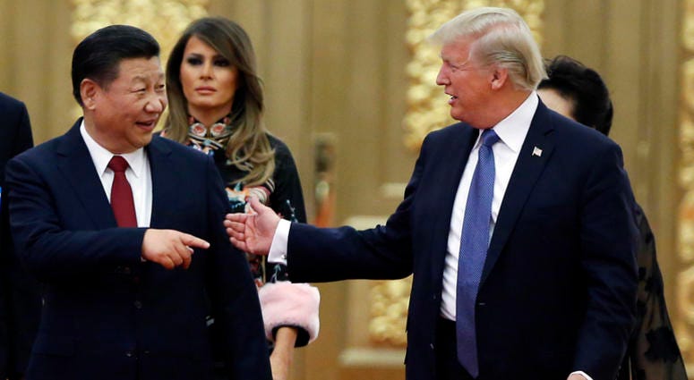 AP18165731963580 In this Nov. 9, 2017, file photo, U.S. President Donald Trump China's President Xi Jinping arrive for the state dinner with the first ladies at the Great Hall of the People in Beijing, China. Trump is closing in on a decision to impose punishing tariffs o