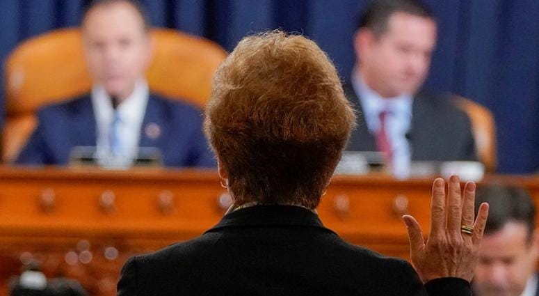 Marie Yovanovitch, former U.S. ambassador to Ukraine, is sworn in before a House Intelligence Committee hearing as part of the impeachment inquiry into U.S. President Donald Trump on Capitol Hill in Washington, U.S., November 15, 2019. Marie Yovanovitch, former U.S. ambassador to Ukraine, is sworn in before a House Intelligence Committee hearing as part of the impeachment inquiry into U.S. President Donald Trump on Capitol Hill in Washington, U.S., November 15, 2019.