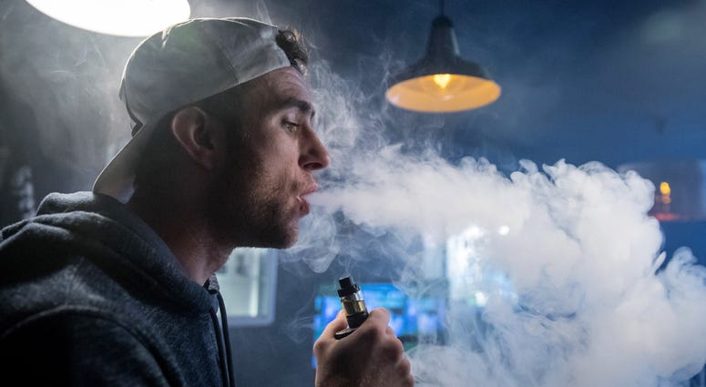 E-cigarette vapor E-cigarette vapor