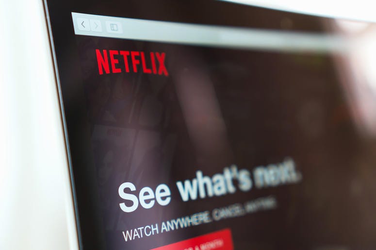 Close up Netflix app icon on Laptop screen. Netflix is an international leading subscription service for watching TV episodes and movies. Close up Netflix app icon on Laptop screen. Netflix is an international leading subscription service for watching TV episodes and movies.