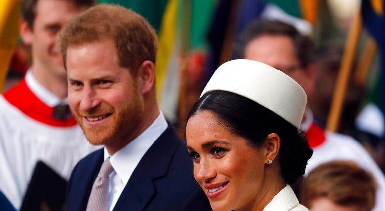 In this Monday, March 11, 2019 file photo, Britain's Prince Harry and Meghan, the Duchess of Sussex leave after the Commonwealth Service at Westminster Abbey in London. DO NOT USE
