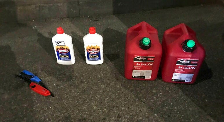 This photo posted on the New York Police Department's Twitter page shows gas cans and lighter fluid that a New Jersey man was seen carrying as he entered St. Patrick’s Cathedral, Wednesday, April 17, 2019, in New York. The suspect has been arrested. AP DO NOT USE