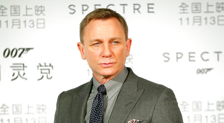 n this Nov. 10, 2015 file photo, British actor Daniel Craig poses for photographers before a press conference for the James Bond franchise movie "Spectre" in Beijing AP DO NOT USE