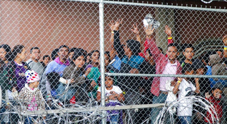 Central American migrants wait for food in El Paso, Texas, Wednesday, March 27, 2019, in a pen erected by U.S. Customs and Border Protection to process a surge of migrant families and unaccompanied minors. Central American migrants wait for food in El Paso, Texas, Wednesday, March 27, 2019, in a pen erected by U.S. Customs and Border Protection to process a surge of migrant families and unaccompanied minors.