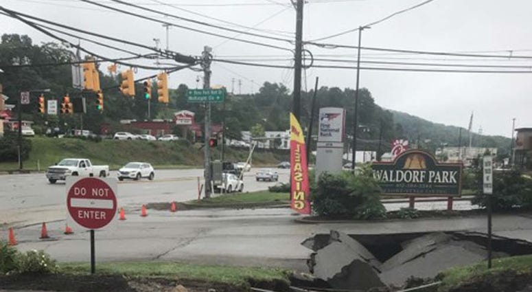 Heavy Rains Cause Sinkhole To Open Along McKnight Road Heavy Rains Cause Sinkhole To Open Along McKnight Road