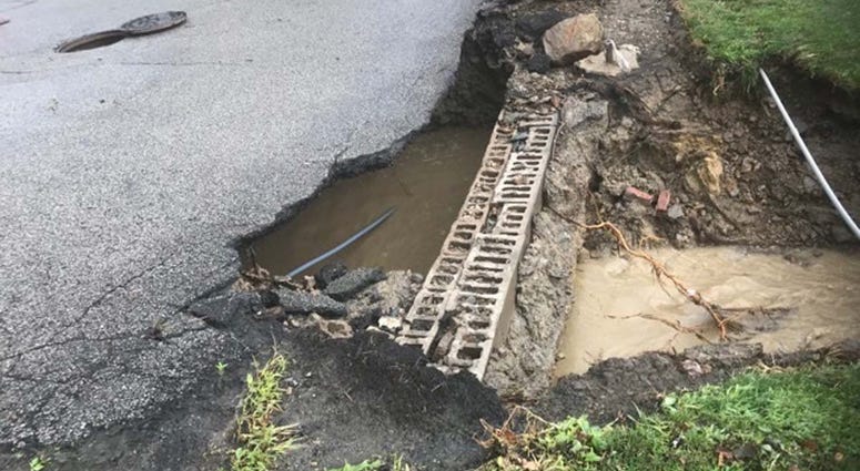 Heavy Rains Cause Sinkhole To Open Along McKnight Road Heavy Rains Cause Sinkhole To Open Along McKnight Road
