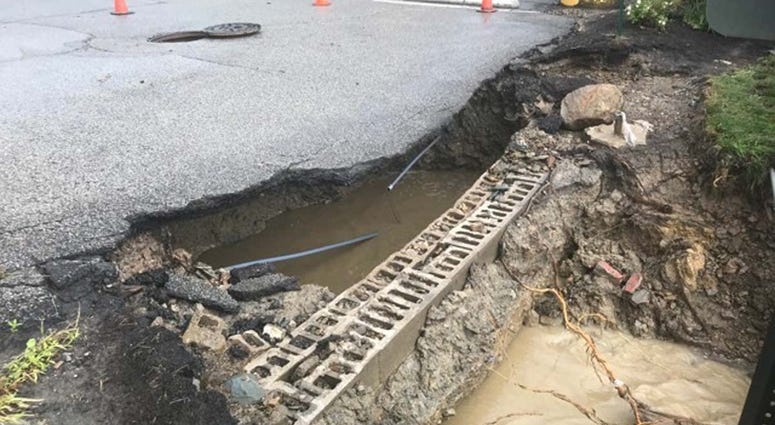 Heavy Rains Cause Sinkhole To Open Along McKnight Road Heavy Rains Cause Sinkhole To Open Along McKnight Road