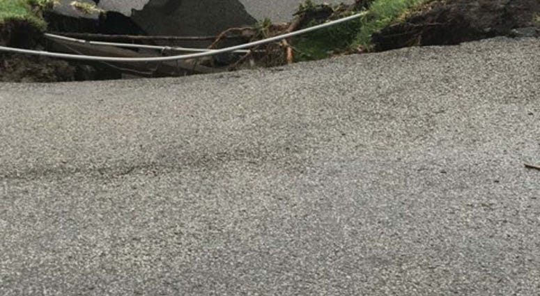Heavy Rains Cause Sinkhole To Open Along McKnight Road Heavy Rains Cause Sinkhole To Open Along McKnight Road