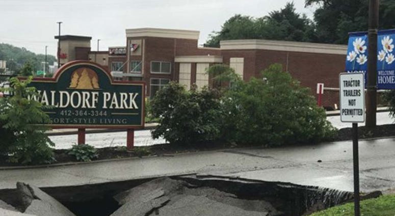 Heavy Rains Cause Sinkhole To Open Along McKnight Road Heavy Rains Cause Sinkhole To Open Along McKnight Road