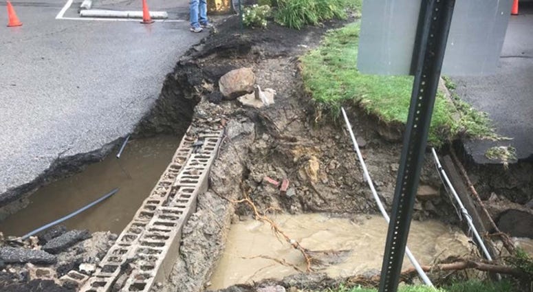 Heavy Rains Cause Sinkhole To Open Along McKnight Road Heavy Rains Cause Sinkhole To Open Along McKnight Road