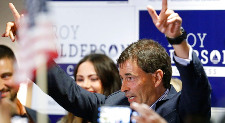 Troy Balderson, Republican candidate for Ohio's 12th Congressional District, greets a crowd of supporters during an election night party Tuesday, Aug. 7, 2018, in Newark, Ohio. DO NOT USE