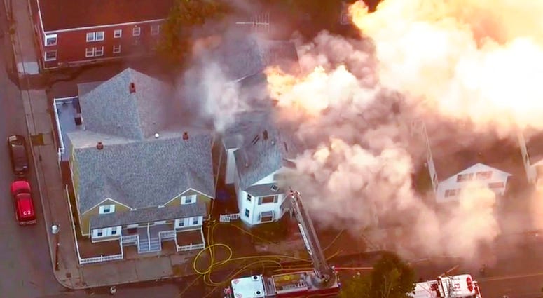 In this image take from video provided by WCVB in Boston, firefighters battle a large structure fire in Lawrence, Mass, a suburb of Boston, Thursday, Sept. 13, 2018. DO NOT USE