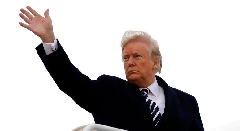 President Donald Trump waves as he boards Air Force One for a campaign rally in Columbia, Mo., Thursday, Nov. 1, 2018, in Andrews Air Force Base, Md. DO NOT USE
