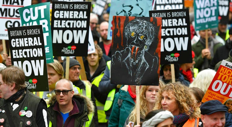 People's Assembly Against Austerity stage a rally in central London calling for a general election. People's Assembly Against Austerity stage a rally in central London calling for a general election.