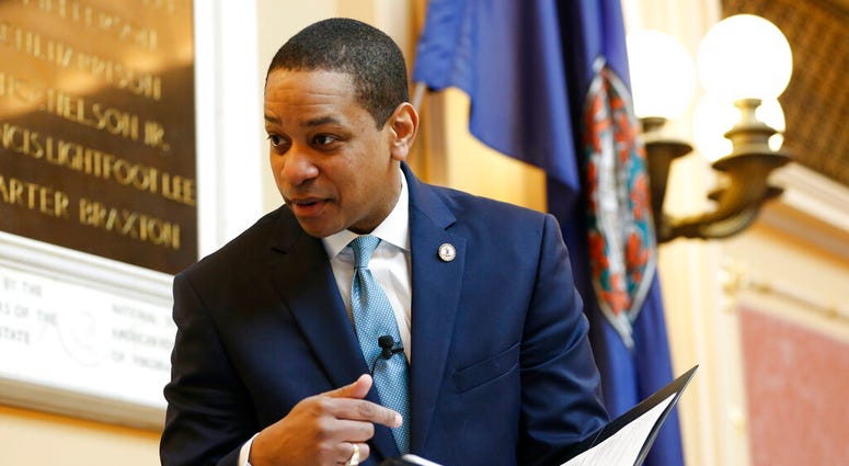 Virginia Lt. Gov Justin Fairfax looks over a briefing book prior to the start of the senate session at the Capitol in Richmond, Va., Thursday, Feb. 7, 2019 Virginia Lt. Gov Justin Fairfax looks over a briefing book prior to the start of the senate session at the Capitol in Richmond, Va., Thursday, Feb. 7, 2019