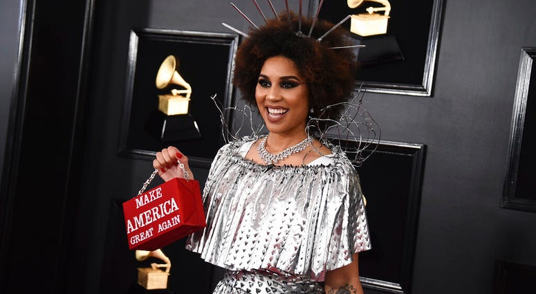 Joy Villa holds a purse that reads "Make America Great Again" at the 61st annual Grammy Awards DO NOT USE AP
