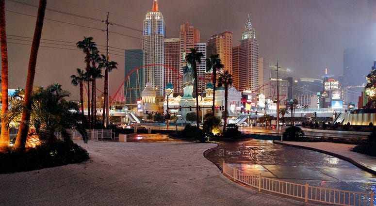 A dusting of snow covers an area along the Las Vegas Strip AP DO NOT USE