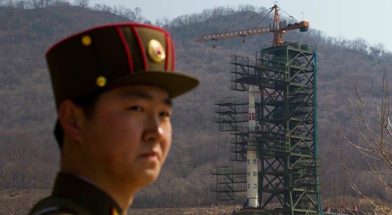 File Photo: A soldier stands in front of a rocket at a launching site in North Korea File Photo: A soldier stands in front of a rocket at a launching site in North Korea