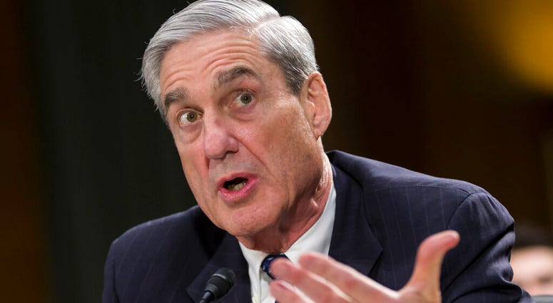 In this June 19, 2013, file photo, Federal Bureau of Investigation Director Robert Mueller testifies before the Senate Judiciary Committee, on Capitol Hill in Washington AP DO NOT USE