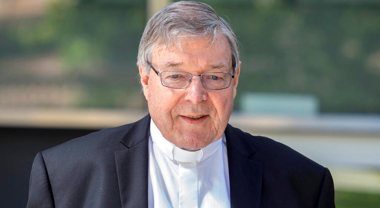 In this Dec 10, 2018, photo, Cardinal George Pell, the most senior Catholic cleric to face sex charges, departs an Australian court. DO NOT USE