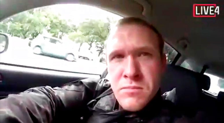 his frame from video that was livestreamed Friday, March 15, 2019, shows a gunman, who used the name Brenton Tarrant on social media, in a car before the mosque shootings in Christchurch, New Zealand. AP DO NOT USE