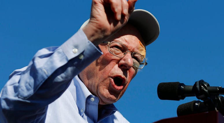 In this March 16, 2019 photo, Democratic presidential candidate Sen. Bernie Sanders speaks at a rally in Henderson, Nev. Sanders spent much of 2016 talking of revolution. AP DO NOT USE