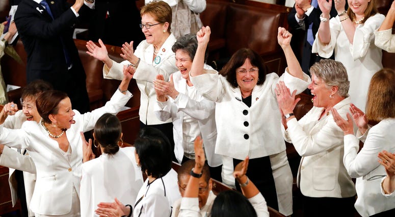 In this Feb. 5, 2019 file photo, women members of Congress cheer after President Donald Trump acknowledges more women in Congress during his State of the Union address to a joint session of Congress on Capitol Hill in Washington. AP DO NOT USE
