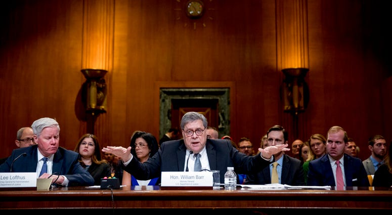 Attorney General William Barr reacts as he appears before a Senate Appropriations subcommittee to make his Justice Department budget request, Wednesday, April 10, 2019, in Washington. AP DO NOT USE