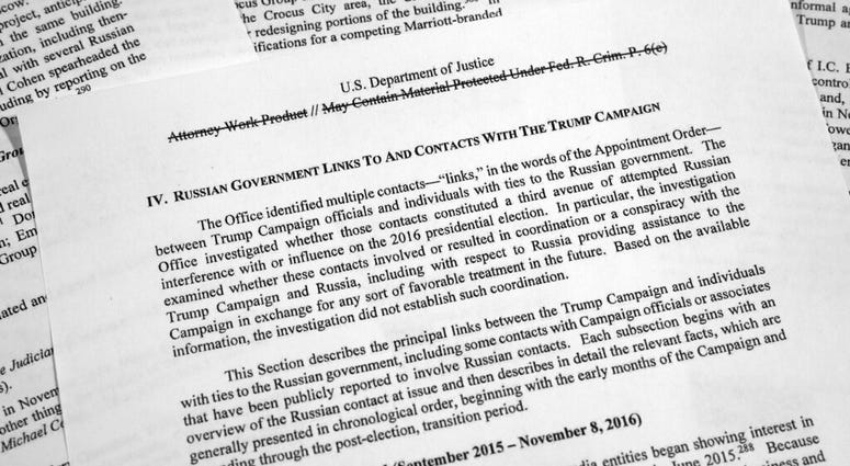 Special counsel Robert Mueller's redacted report on Russian interference in the 2016 presidential election as released on Thursday, April 18, 2019, is photographed in Washington. AP DO NOT USE