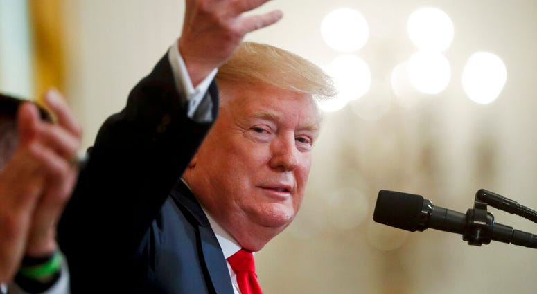 President Donald Trump gestures while speaking at a Wounded Warrior Project Soldier Ride event in the East Room of the White House, Thursday, April 18, 2019, in Washington. AP DO NOT USE