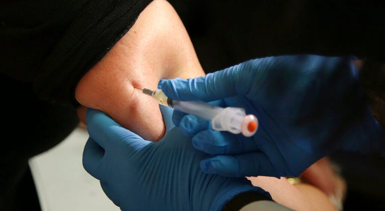 In this March 27, 2019, file photo, a woman receives a measles, mumps and rubella vaccine at the Rockland County Health Department in Pomona, N.Y. AP DO NOT USE
