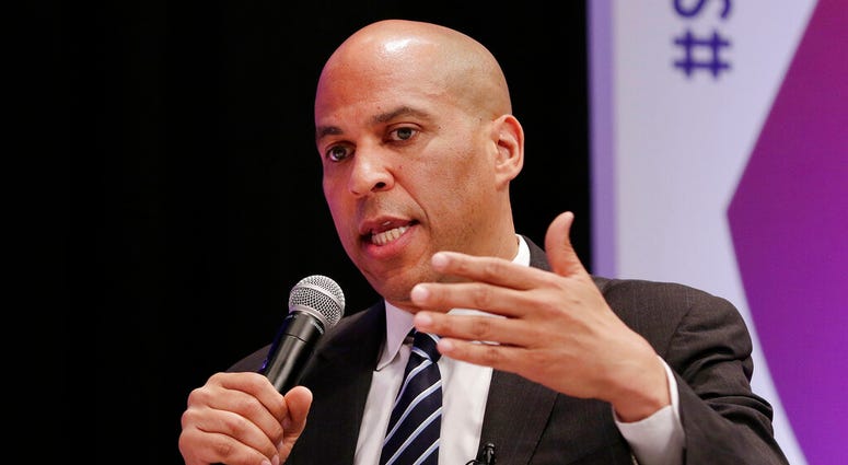 Democratic presidential candidate Sen. Cory Booker, D-N.J., answers questions during a presidential forum held by She The People on the Texas State University campus Wednesday, April 24, 2019, in Houston. AP DO NOT USE