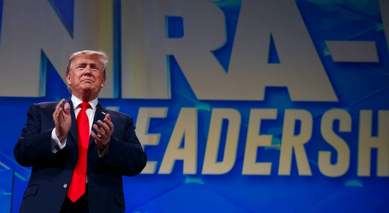 President Donald Trump arrives to speak to the annual meeting of the National Rifle Association, Friday, April 26, 2019, in Indianapolis. AP DO NOT USE