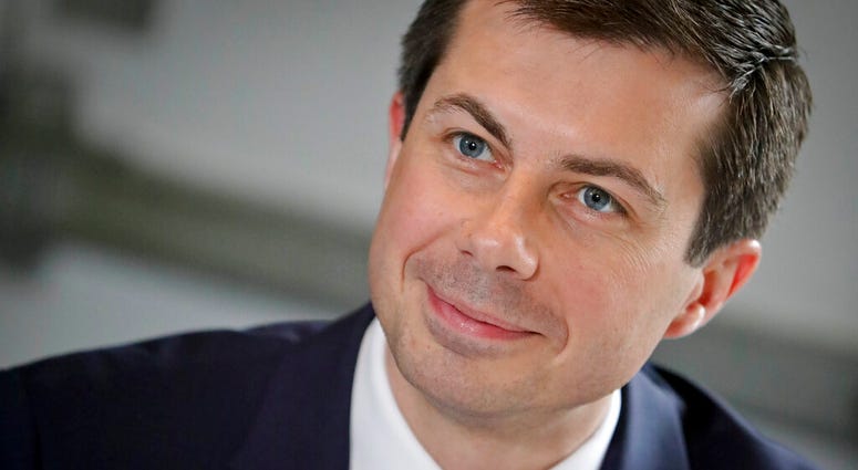 In this April 29, 2019, photo, Democratic presidential candidate Mayor Pete Buttigieg, from South Bend, Ind.,, listens during a lunch meeting with civil rights leader Rev. Al Sharpton at Sylvia's Restaurant in Harlem neighborhood of New York. ap do not use